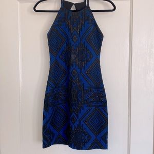 Blue and black patterned body con dress with beautiful open back. Worn twice.
